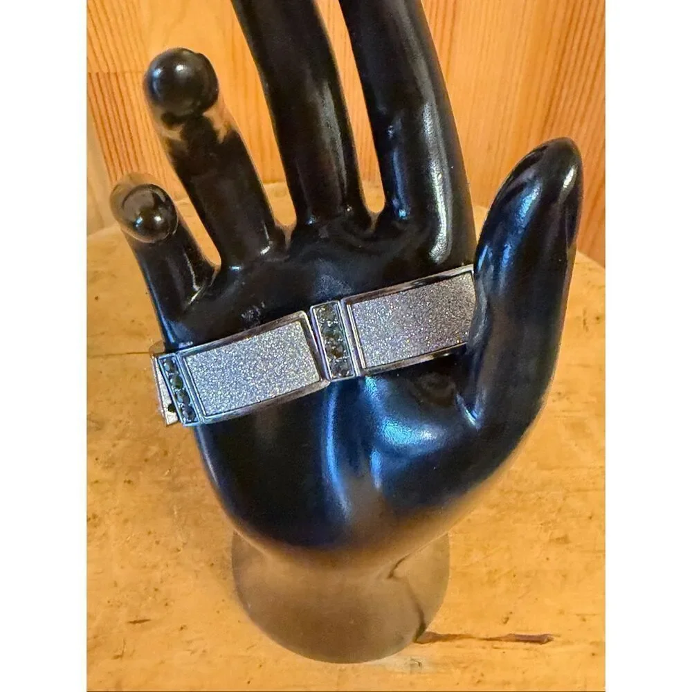 silver-tone bracelet featuring a glittery sparkly face with Dark Stones (7445)
